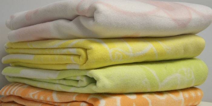 Байкова ковдра для новонароджених - як вибрати розмір для дитячого ліжечка і прати в машинці