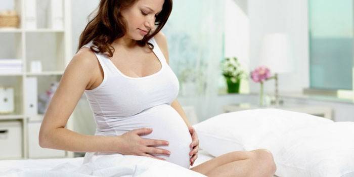 Гіпертонус матки при вагітності - як зняти, причини і симптоми на ранніх або пізніх термінах