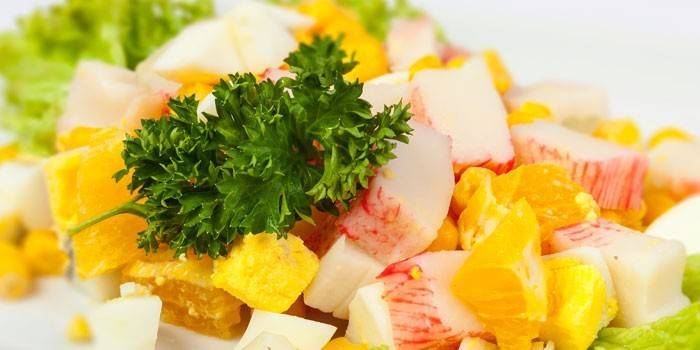 Салат з апельсином і крабовими паличками - опис популярних рецептів приготування з фото